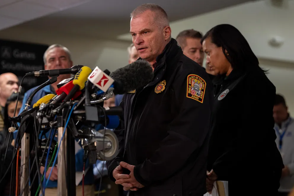 DC Fire and EMS Chief John Donnelly speaking at a press conference with other government officials on the rescue efforts following a collision between an American Airlines plane and an Army helicopter in Washington, D.C., on January 30, 2025. | Source: Getty Images 